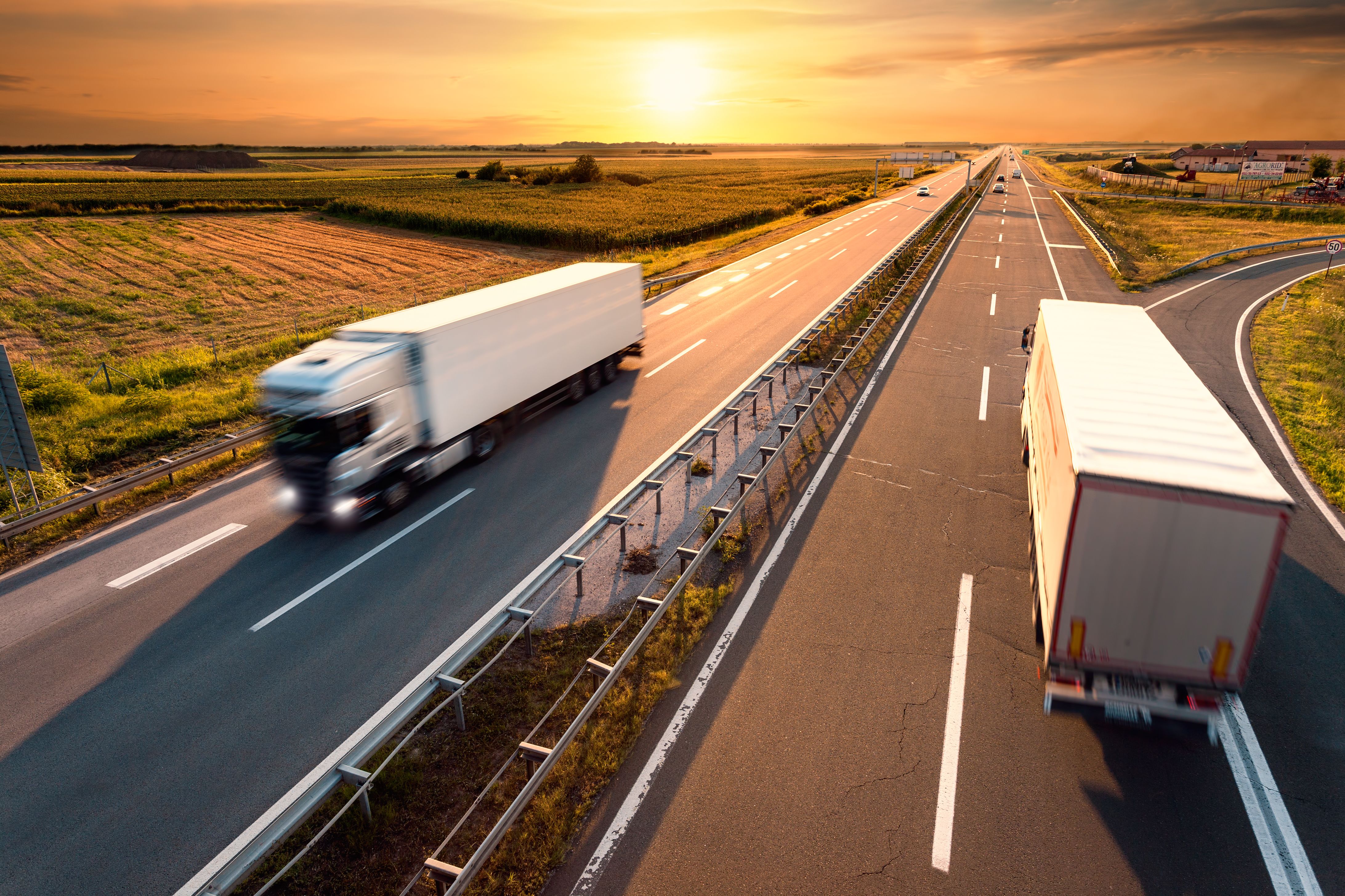trucks driving on highway